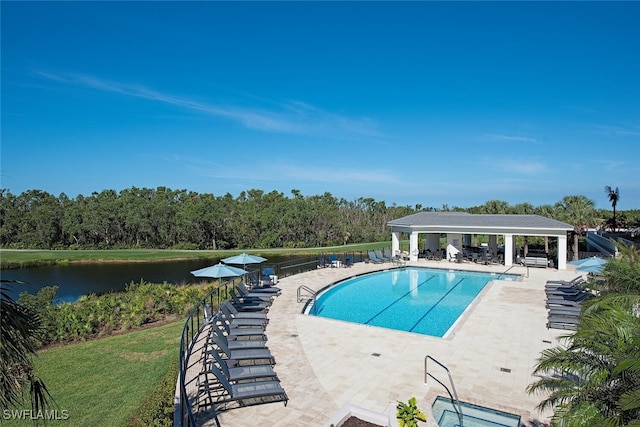 view of swimming pool featuring a gazebo, a water view, and a patio