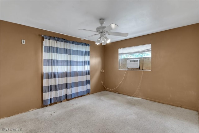 unfurnished room featuring carpet flooring, ceiling fan, and cooling unit