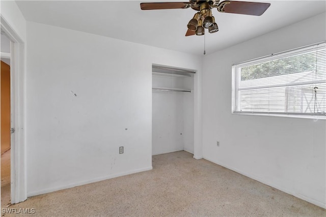 unfurnished bedroom with a closet and ceiling fan