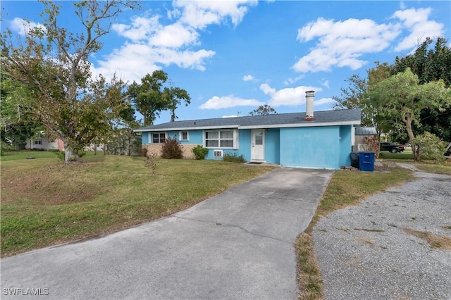 single story home with a front yard