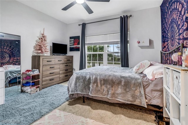 carpeted bedroom with ceiling fan