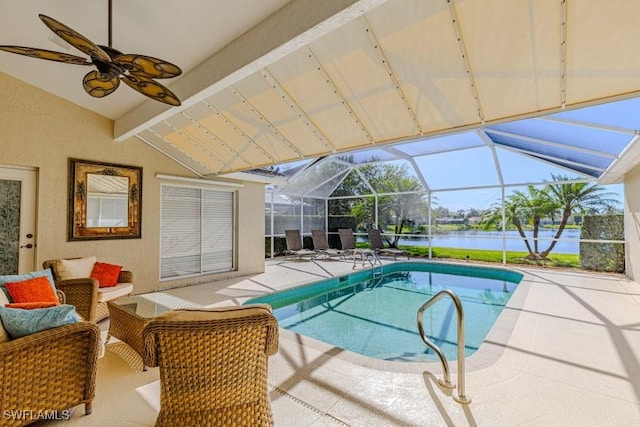 view of swimming pool with a lanai, a water view, and a patio