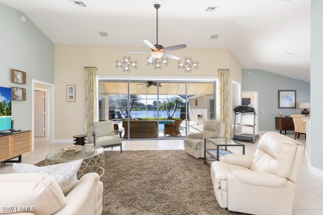 tiled living room featuring ceiling fan and lofted ceiling