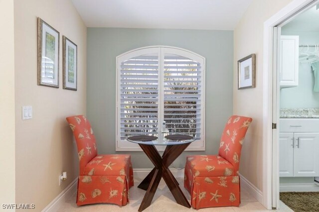 sitting room featuring light tile patterned floors