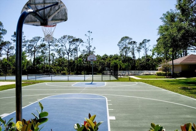 view of basketball court featuring tennis court