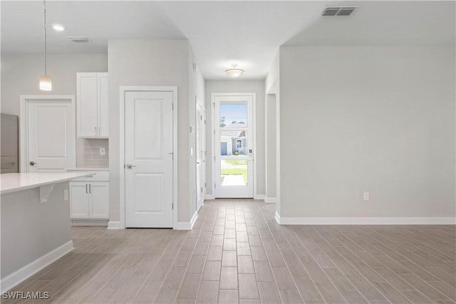 entrance foyer featuring light wood-type flooring