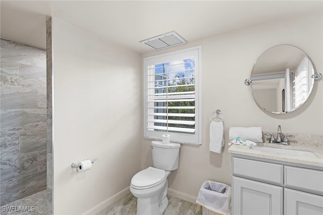 bathroom featuring hardwood / wood-style floors, vanity, and toilet