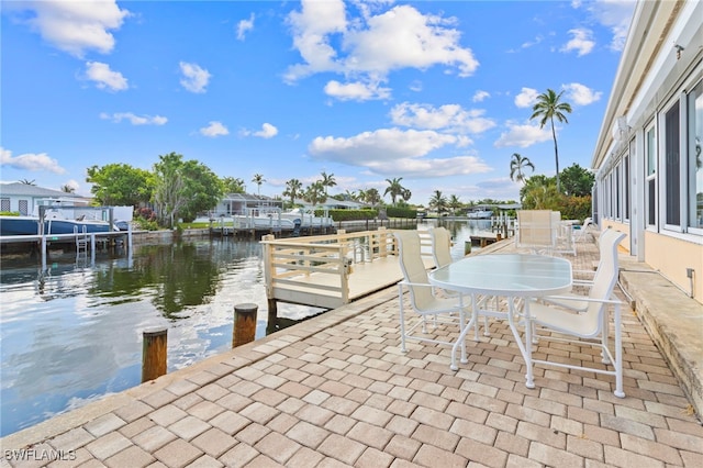 dock area with a water view