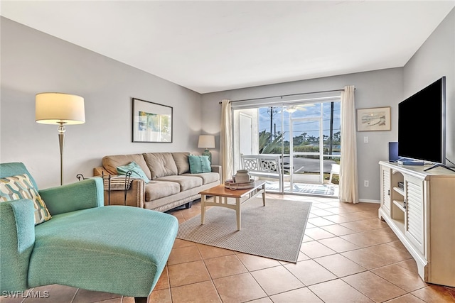 living room with light tile patterned flooring