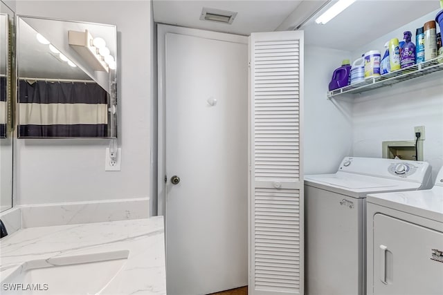 laundry area featuring washer and dryer