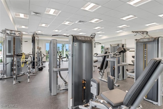 workout area featuring a drop ceiling