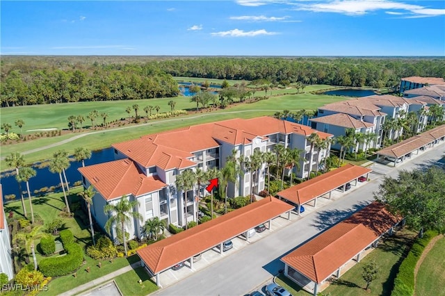 bird's eye view with a water view