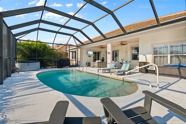 pool with a grill, a ceiling fan, a patio area, a lanai, and an outdoor hangout area