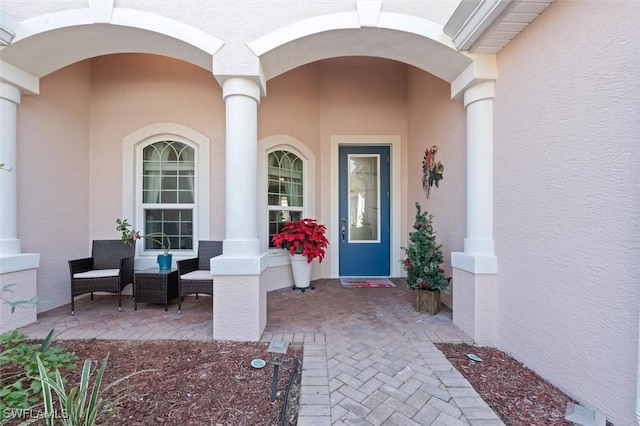3259 Hampton Blvd, Alva, FL 33920 - view of exterior entry with a porch and stucco siding