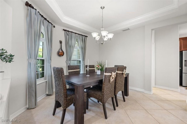 3259 Hampton Blvd, Alva, FL 33920 - dining room featuring a chandelier, a raised ceiling, ornamental molding, and light tile patterned flooring