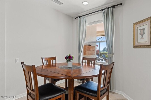 view of tiled dining room