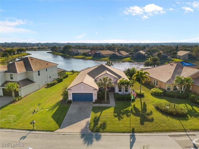 bird's eye view with a water view