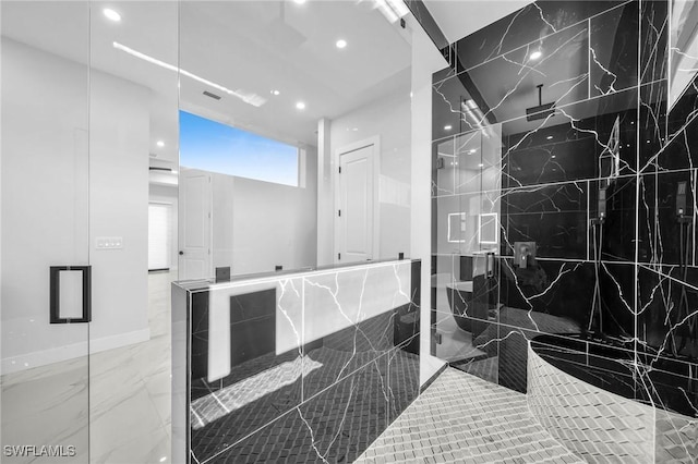 bathroom with an enclosed shower