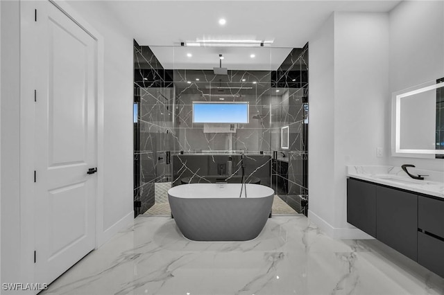 bathroom featuring separate shower and tub and vanity