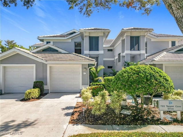 front of property with a garage