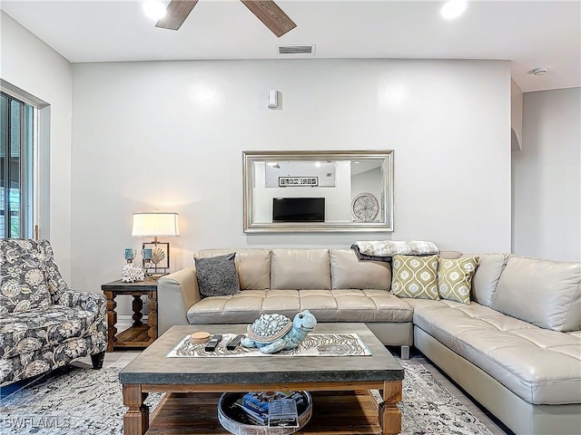 living room with ceiling fan