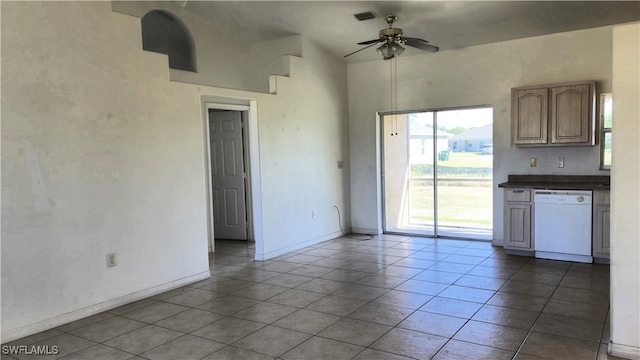 kitchen with tile patterned floors, ceiling fan, and white dishwasher