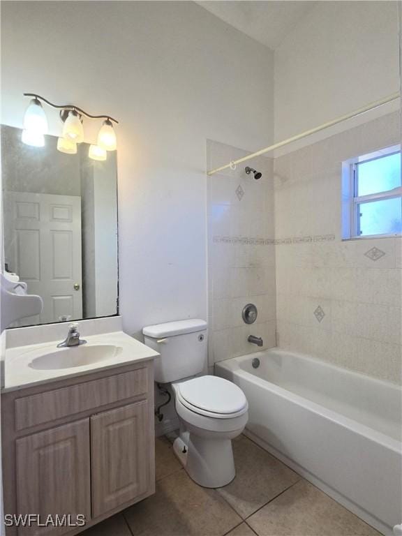 2419 NE 23rd Ave, Cape Coral, FL 33909 - bathroom with tile patterned flooring, toilet, washtub / shower combination, and vanity