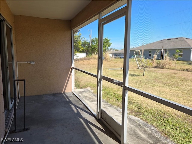 view of unfurnished sunroom