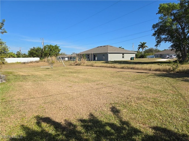 2419 NE 23rd Ave, Cape Coral, FL 33909 - view of green lawn