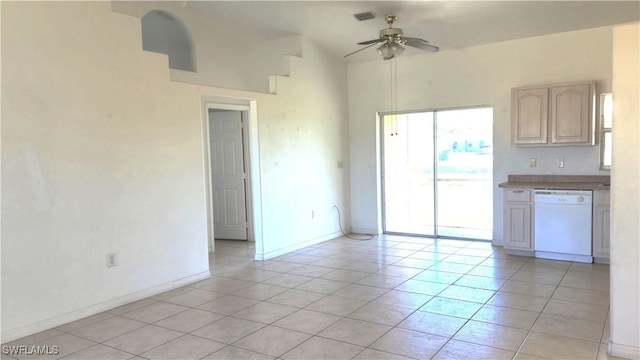 2419 NE 23rd Ave, Cape Coral, FL 33909 - unfurnished living room with light tile patterned flooring, a ceiling fan, and baseboards