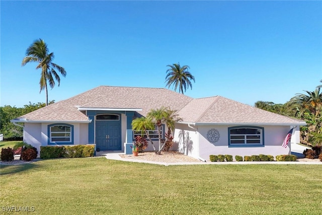 ranch-style house featuring a front yard