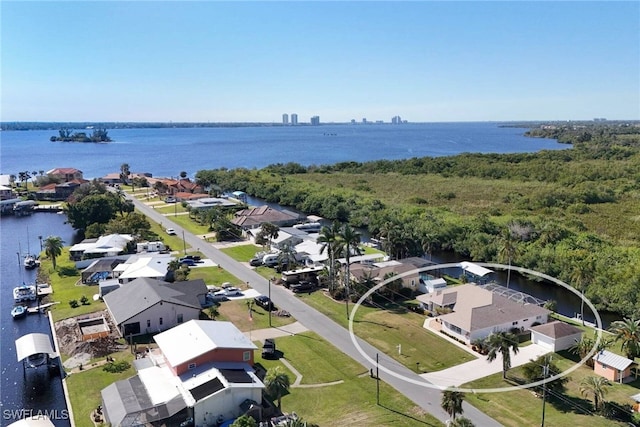 drone / aerial view with a water view