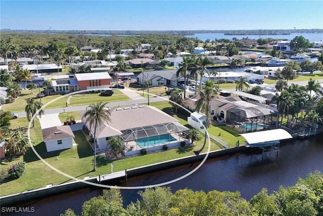 drone / aerial view with a water view