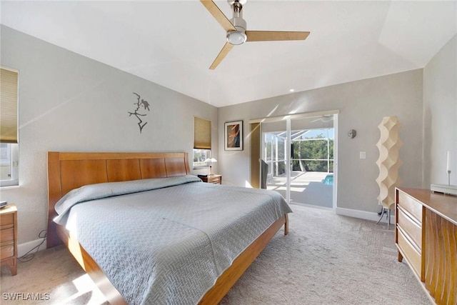 carpeted bedroom featuring access to outside and ceiling fan