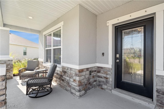 property entrance with a porch