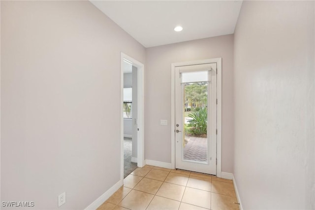 11823 Timbermarsh Ct, Fort Myers, FL 33913 - doorway to outside featuring healthy amount of natural light, baseboards, light tile patterned floors, and recessed lighting
