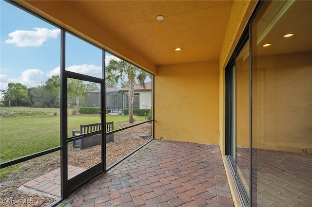 view of unfurnished sunroom