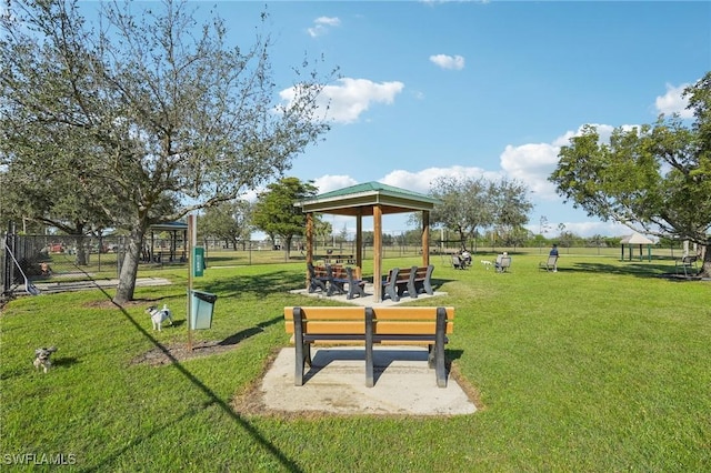 view of community with a gazebo and a lawn