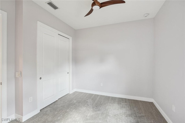 11823 Timbermarsh Ct, Fort Myers, FL 33913 - unfurnished bedroom featuring carpet, baseboards, ceiling fan, and a closet