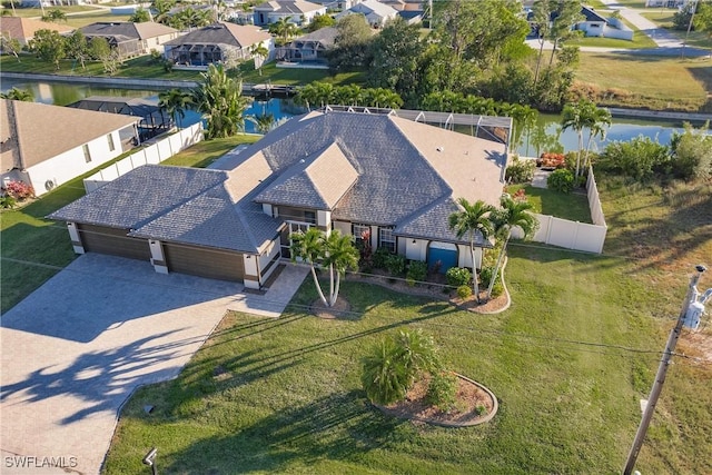 aerial view featuring a residential view and a water view