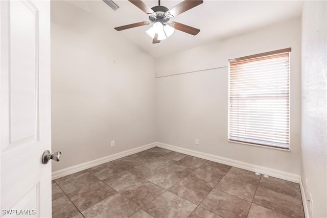 unfurnished room featuring tile patterned flooring and ceiling fan