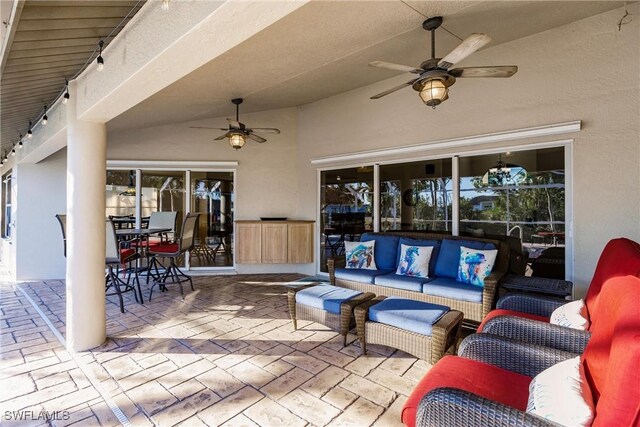 view of patio featuring outdoor lounge area and ceiling fan