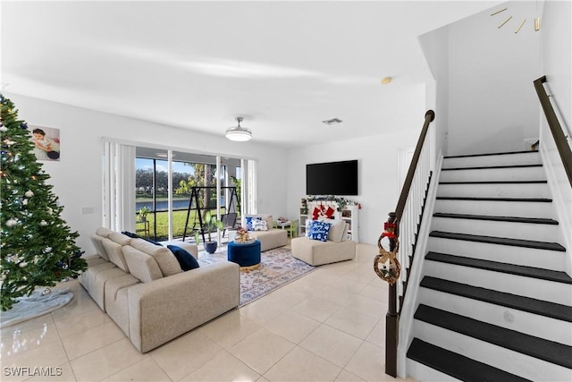 living room featuring light tile patterned flooring