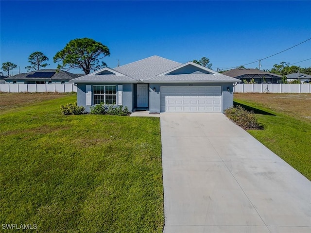 single story home with a garage and a front lawn