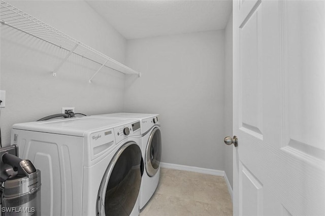 laundry area featuring separate washer and dryer