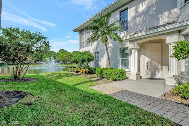 view of yard with a water view