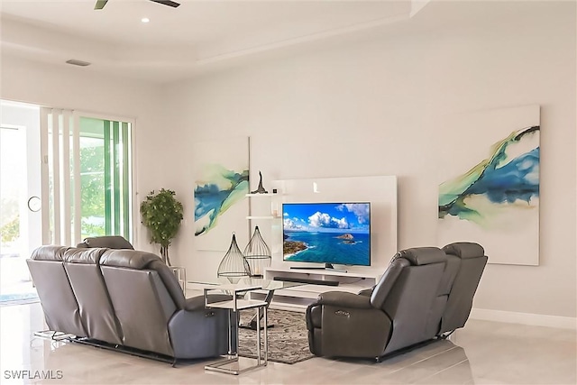 living room featuring ceiling fan