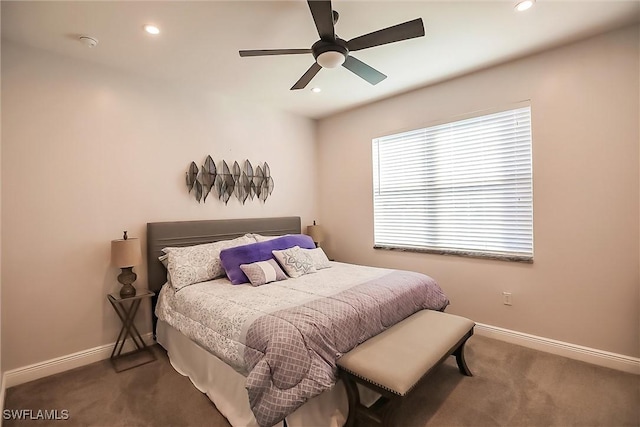 carpeted bedroom with ceiling fan