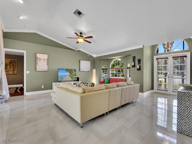 living room featuring french doors, crown molding, ceiling fan, and lofted ceiling