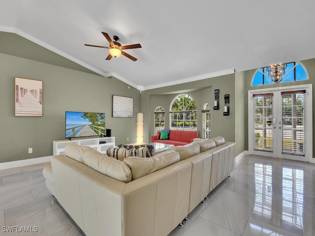 tiled living room featuring french doors, ceiling fan with notable chandelier, ornamental molding, and lofted ceiling